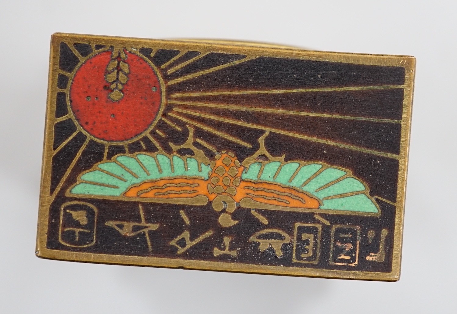 A Zenith champleve enamel Egyptianesque travelling alarm clock in case, 10cm total height